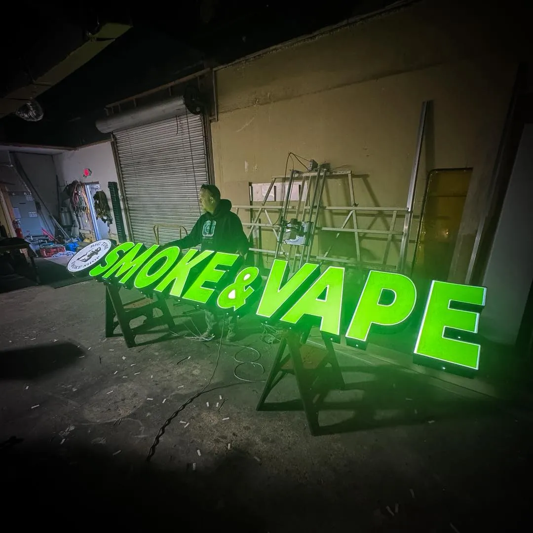 Commercial sign repair in Jacksonville with technicians performing signage repair and business sign light repair